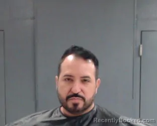 Mugshot of Marcus Alfredo Zuniga booked in Hunt County, Texas on October 1, 2026