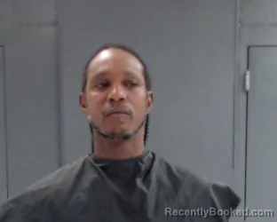 Mugshot of Ottugas Rechard Johnson booked in Hunt County, Texas on October 6, 2026