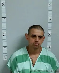 Mugshot of Alonso Jacob Flores booked in Hutchinson County, Texas on July 14, 2026