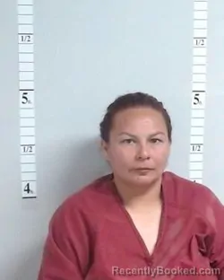 Mugshot of Juanita Rebecca Espinosa booked in Hutchinson County, Texas on July 25, 2026