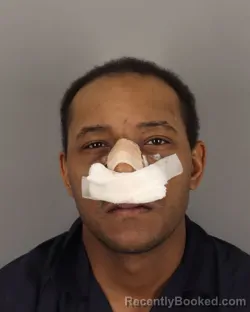 Mugshot of WILFORD HARMON