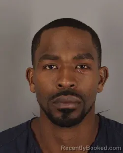 Mugshot of DOMINEK HOLMES booked in Jefferson County, Texas on March 15, 2026