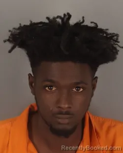 Mugshot of JAKAVIN HARMON