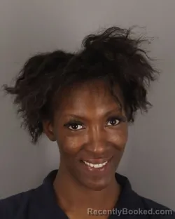 Mugshot of NAKITTA ENGLAND booked in Jefferson County, Texas on March 19, 2026