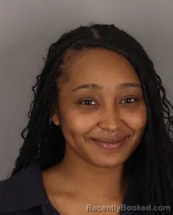 Mugshot of DESIREE DOUCET booked in Jefferson County, Texas on March 21, 2026