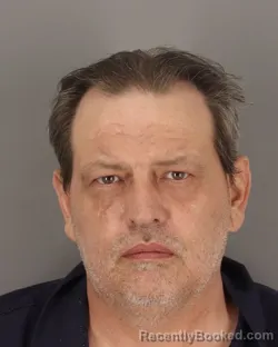 Mugshot of JUSTIN TRACY booked in Jefferson County, Texas on March 28, 2026