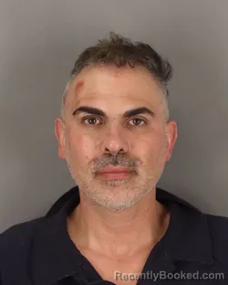 Mugshot of ORLANDO MIGUEZ booked in Jefferson County, Texas on May 18, 2026