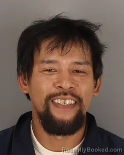 Mugshot of Canh Nguyen booked in Jefferson County, Texas on August 19, 2026