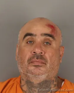 Mugshot of Carlos Enriquez booked in Jefferson County, Texas on August 23, 2026