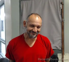 Mugshot of DANIEL REYNA