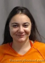 Mugshot of JUSTINE DYAN WILLIAMS booked in Karnes County, Texas on April 23, 2026