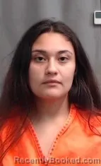 Mugshot of DESTINY MENDOZA booked in Karnes County, Texas on May 10, 2026