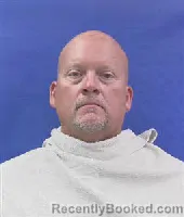 Mugshot of Travis Michael Holland booked in Kaufman County, Texas on August 14, 2026