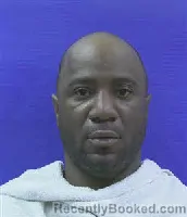 Mugshot of MIGUEL ANTOINE NEWTON booked in Kaufman County, Texas on May 11, 2026