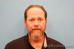 Mugshot of John Polly booked in Kendall County, Texas on March 23, 2026