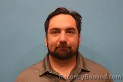 Mugshot of Carl Badertscher booked in Kendall County, Texas on May 13, 2026