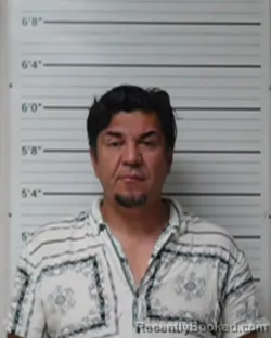 Mugshot of Santos Olvera booked in Kerr County, Texas on March 30, 2026