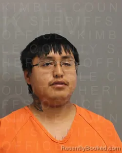 Mugshot of ELLERY ALFRED YAZZIE booked in Kimble County, Texas on April 15, 2026