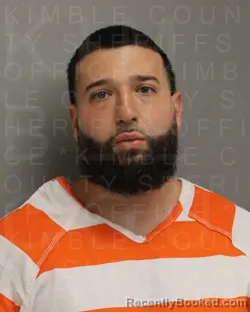 Mugshot of Ali Mustafa Laith booked in Kimble County, Texas on September 18, 2026