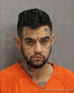Mugshot of Mark Aaron Rodriguez booked in Kimble County, Texas on October 6, 2026