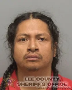 Mugshot of MIGUEL MATEO booked in Lee County, Florida on March 12, 2026