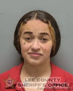 Mugshot of GIA MARIE CARMEN LOUIS RIVERA BATZING booked in Lee County, Florida on April 14, 2026