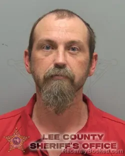 Mugshot of DANIEL OWEN FLANNELLY booked in Lee County, Florida on April 14, 2026