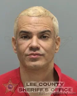 Mugshot of CARLOS ALBERTO SANTOS MANOTAS booked in Lee County, Florida on April 14, 2026