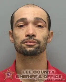Mugshot of Christopher Patrick Jean Louis booked in Lee County, Florida on October 3, 2026