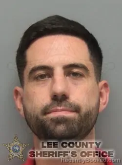 Mugshot of Adam Michael Kien booked in Lee County, Florida on October 5, 2026