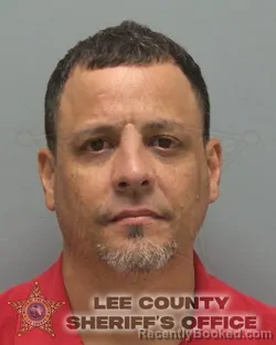 Mugshot of Alexsandro Roman booked in Lee County, Florida on October 7, 2026