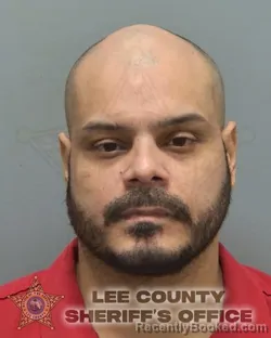 Mugshot of Amos Jr Ortiz booked in Lee County, Florida on October 13, 2026