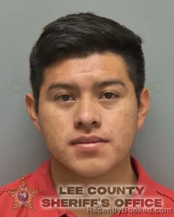 Mugshot of Junior Michael Perez Perez booked in Lee County, Florida on October 14, 2026