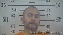 Mugshot of MARCO BUSTAMANTE