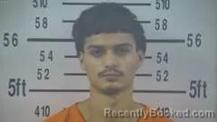 Mugshot of ISAAC SARMIENTO