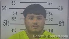 Mugshot of OLIVER FLORES booked in Kleberg County, Texas on April 1, 2026