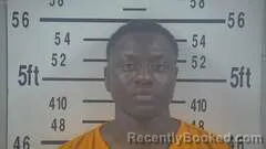 Mugshot of NIMROD KIYOLA booked in Kleberg County, Texas on April 26, 2026