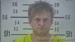 Mugshot of CAMERON CAROSIELLI booked in Kleberg County, Texas on July 14, 2026