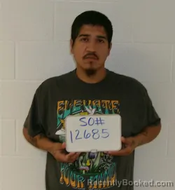 Mugshot of Carlos Garza Flores booked in Lavaca County, Texas on September 27, 2026