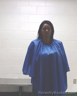 Mugshot of DORA AMINTA DOMINGUEZ