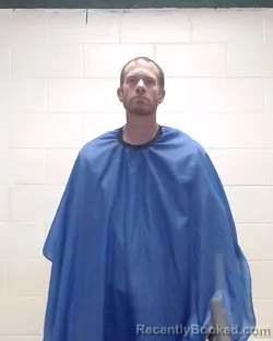 Mugshot of DUSTIN TRAGESSER booked in Liberty County, Texas on March 18, 2026