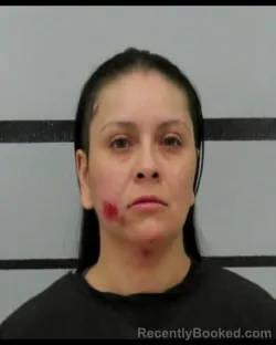 Mugshot of RAYMIE AGUIRRE booked in Lubbock County, Texas on June 6, 2026