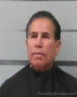 Mugshot of RAYMUNDO ALMARAZ