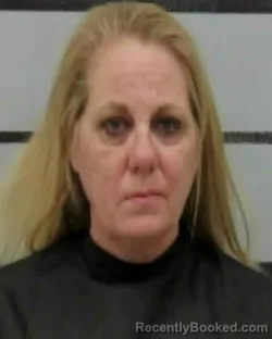 Mugshot of KRYSTAL LEE-ANN BLOSSOM booked in Lubbock County, Texas on March 19, 2026