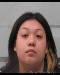 Mugshot of MONA RAYLISSA BARCENAS booked in Lubbock County, Texas on March 26, 2026