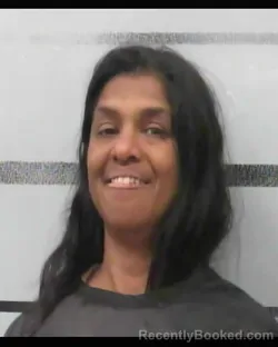 Mugshot of BARBARA DSOUZA booked in Lubbock County, Texas on May 13, 2026