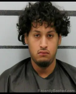 Mugshot of BRYAN FLORES booked in Lubbock County, Texas on August 4, 2026