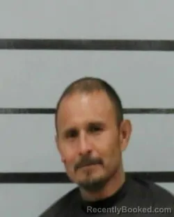 Mugshot of CHRISTOPHER FLORES booked in Lubbock County, Texas on March 21, 2026