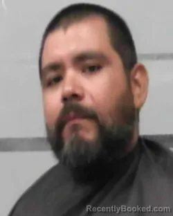 Mugshot of MARIO ALAN FLORES booked in Lubbock County, Texas on July 17, 2026