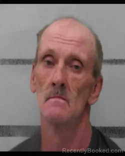 Mugshot of BART KENIISTON HOLLOMAN booked in Lubbock County, Texas on March 22, 2026